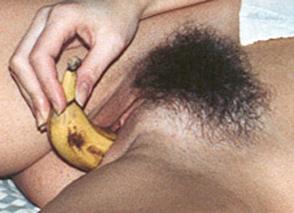 SANDY MASTURBATING WITH A BANANA