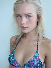 Sweet Blue Eyed Blond Wearing Bikini